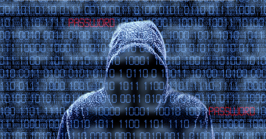 hooded figure and codes symbolizing insider threats