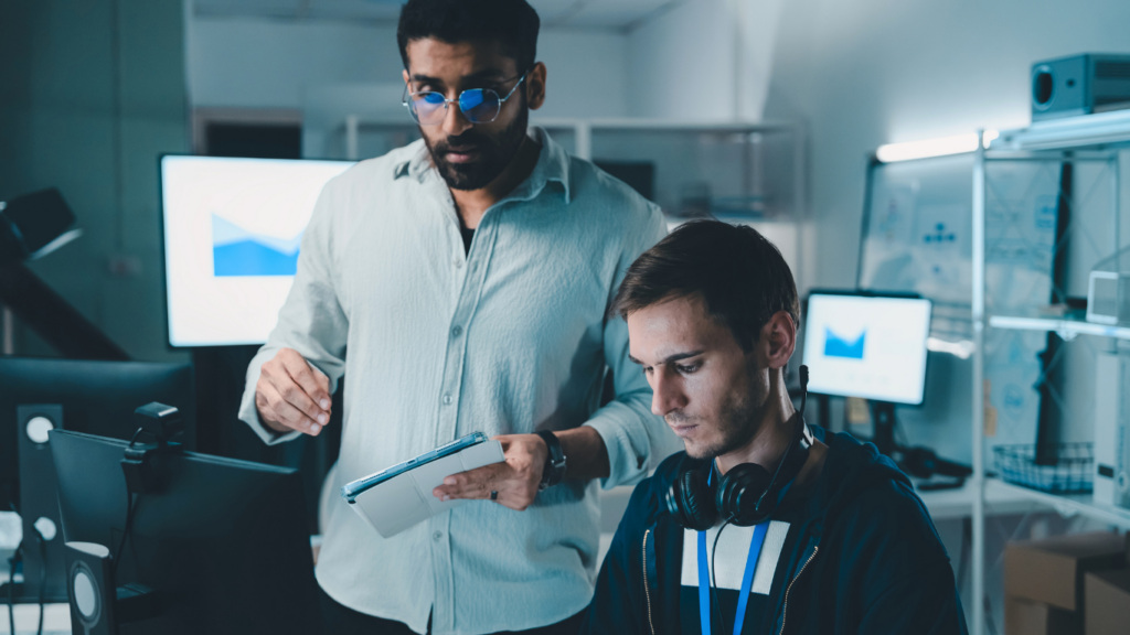 Converged security solutions being discussed by two employees